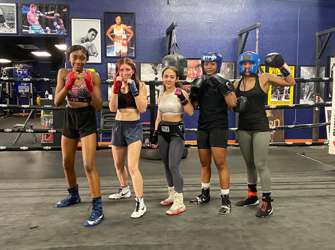 Young hardworking boxer learning to box. child at sport center. kid taking up a new hobby<br />